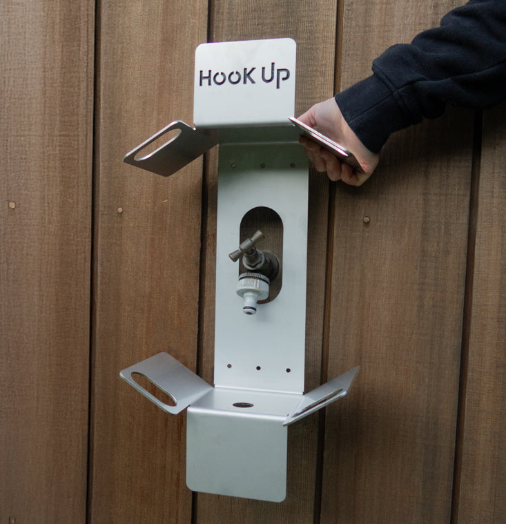 Hook Up Premium stainless steel garden hose reel mounted on a hose faucet/tap