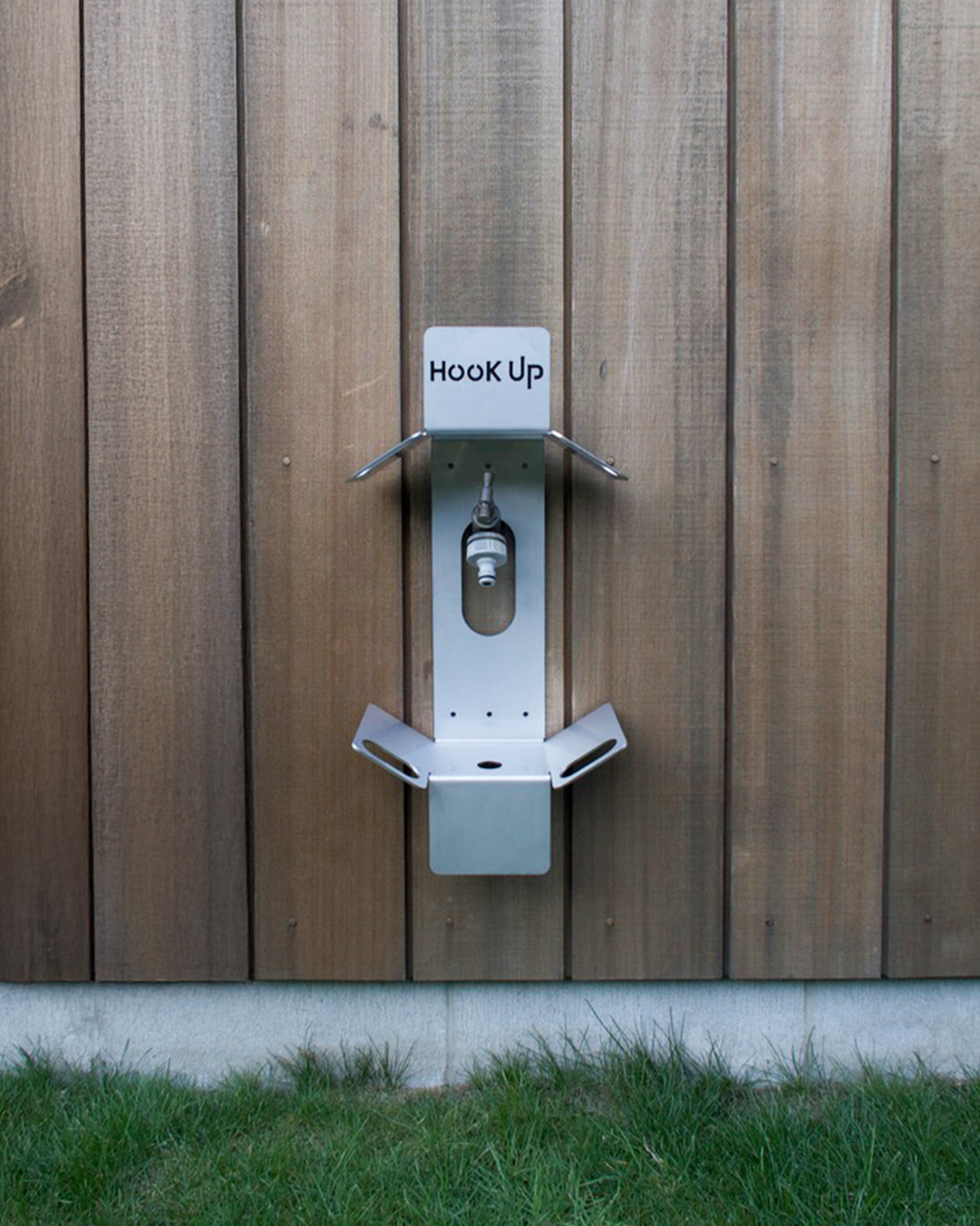 Hook Up Premium stainless steel garden hose reel mounted on a hose faucet/tap